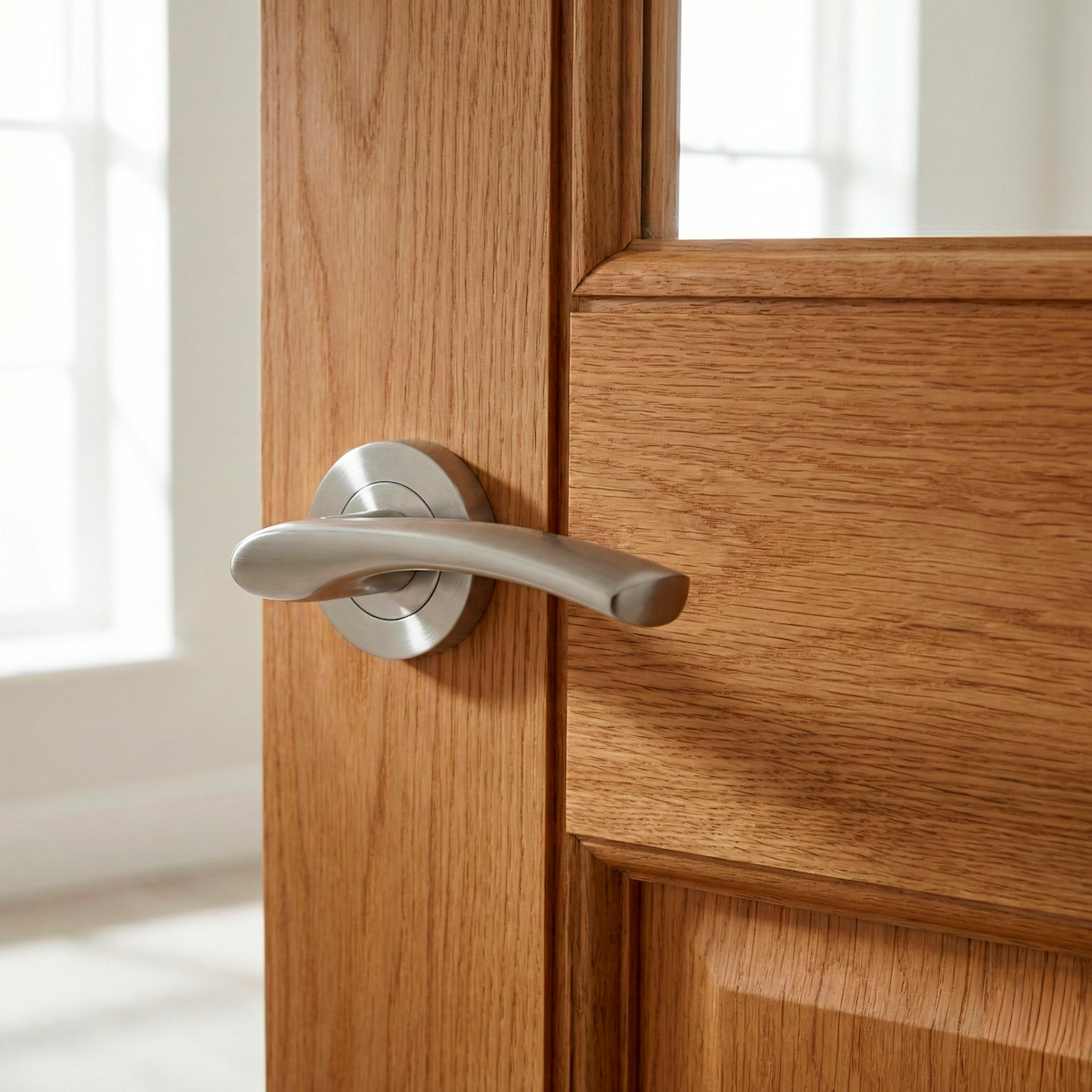 Poignée Hermès en aluminium avec rosace ronde finition nickel satiné pour portes