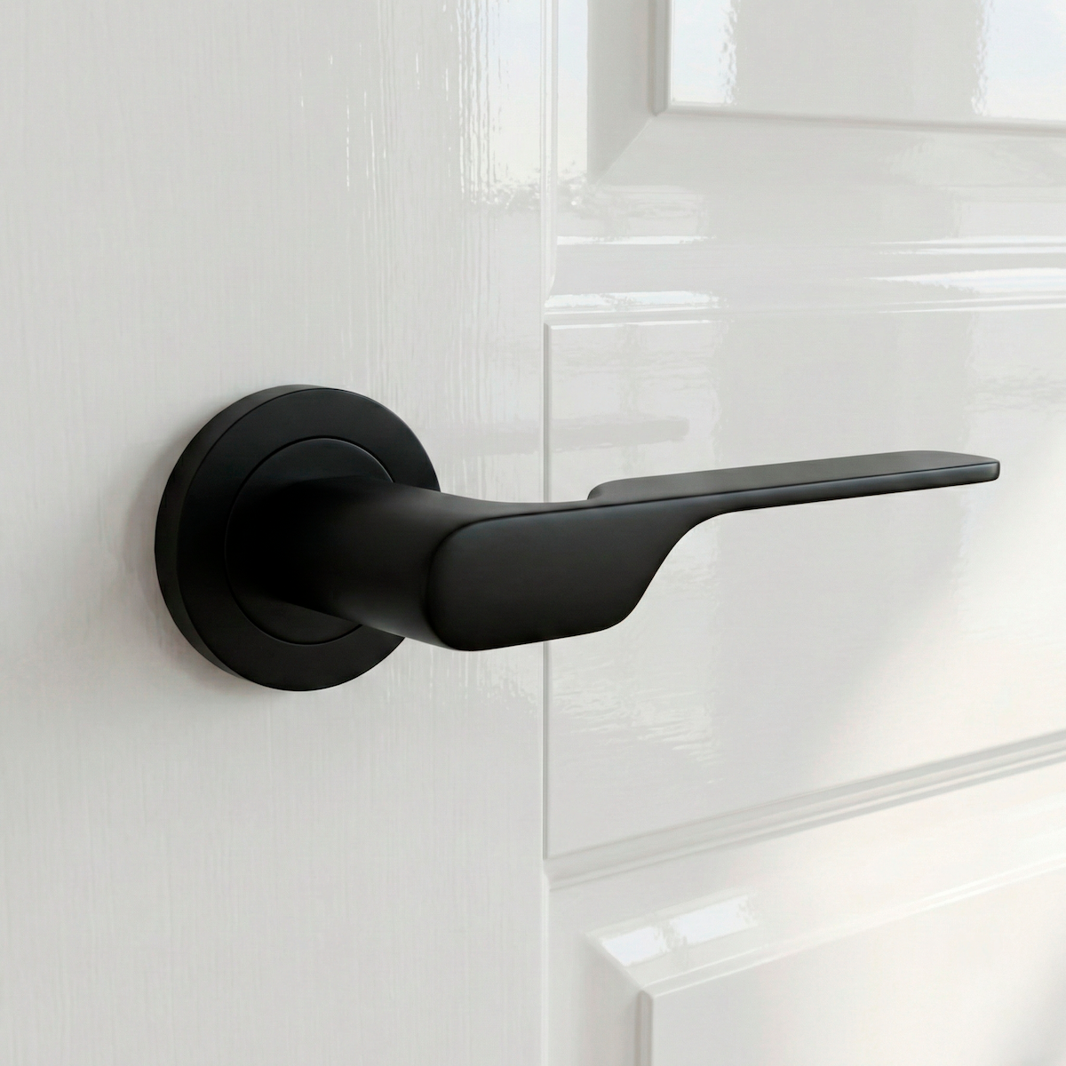 Béquille de porte modèle 640 en zamak avec rosace ronde finition noire