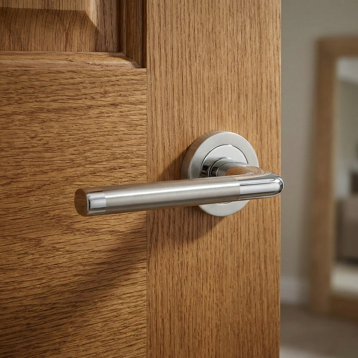 Béquille de porte en zamak modèle '140' finition bicolore avec rosace ronde pour portes intérieures