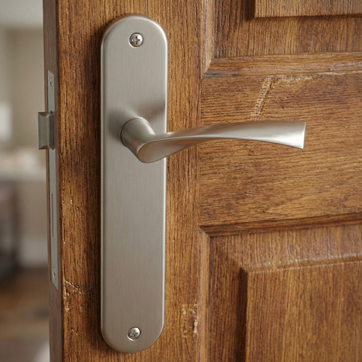 Poignée modèle '130A' vague avec plaque ovale en aluminium pour portes en finition nickel satiné