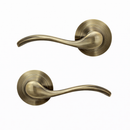 Poignée de porte modèle '3001C' ondulée rustique avec rosace ronde finition cuir