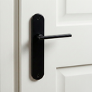 Poignée modèle « 530 » en aluminium avec plaque ovale finition noir mat pour portes