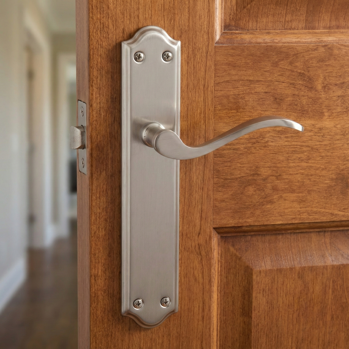 Béquille modèle « 1101 » en zamak avec plaque incurvée finition nickel satiné pour portes